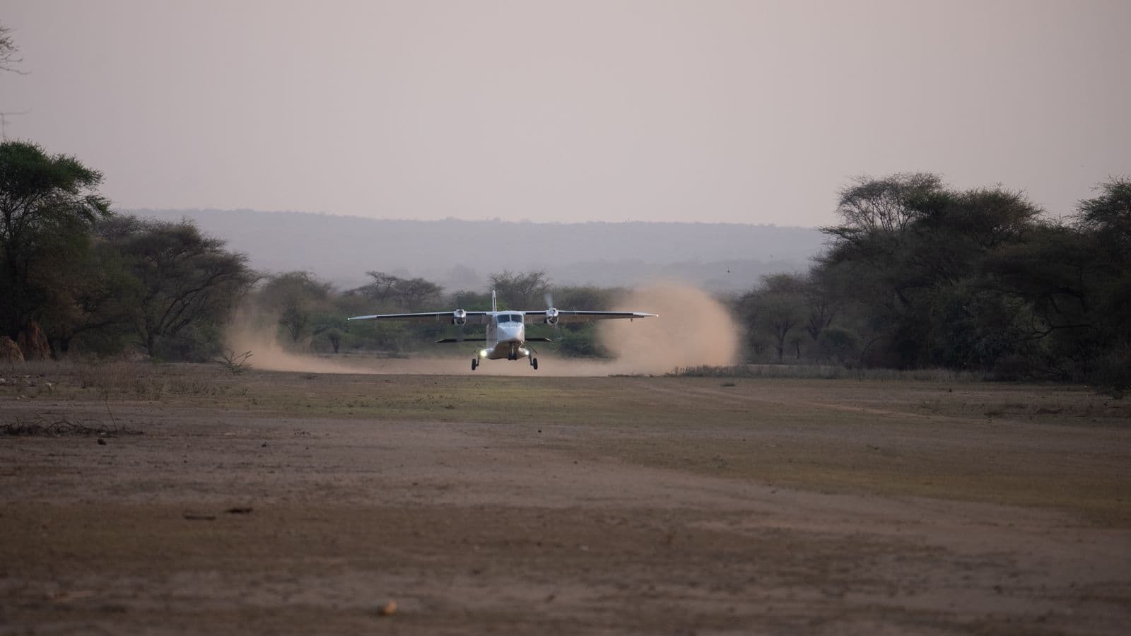 Kasas Dornier 228 landing on remote humanitarian airstrip