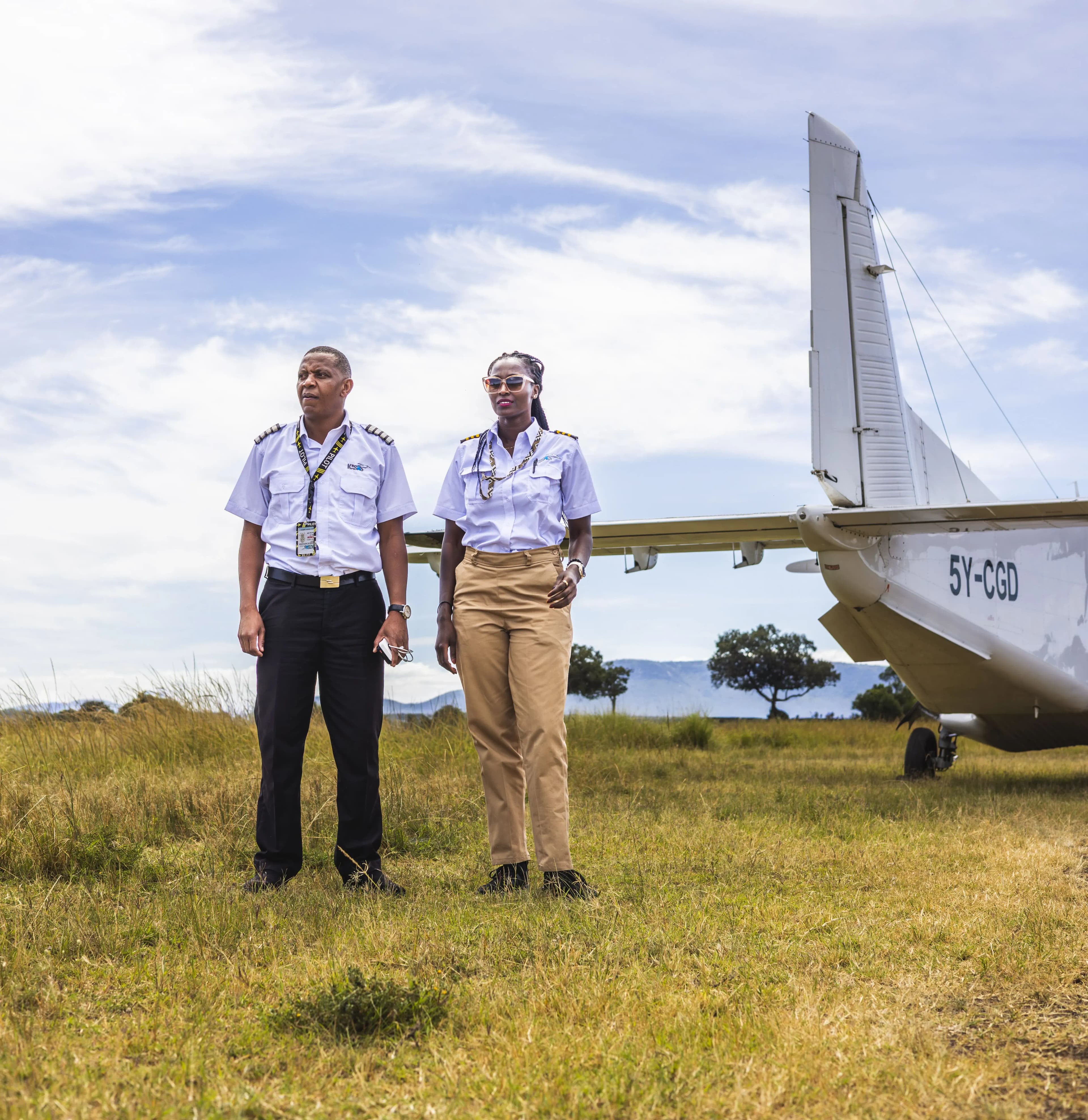 Two Kasas pilots after a safe landing in the Mara
