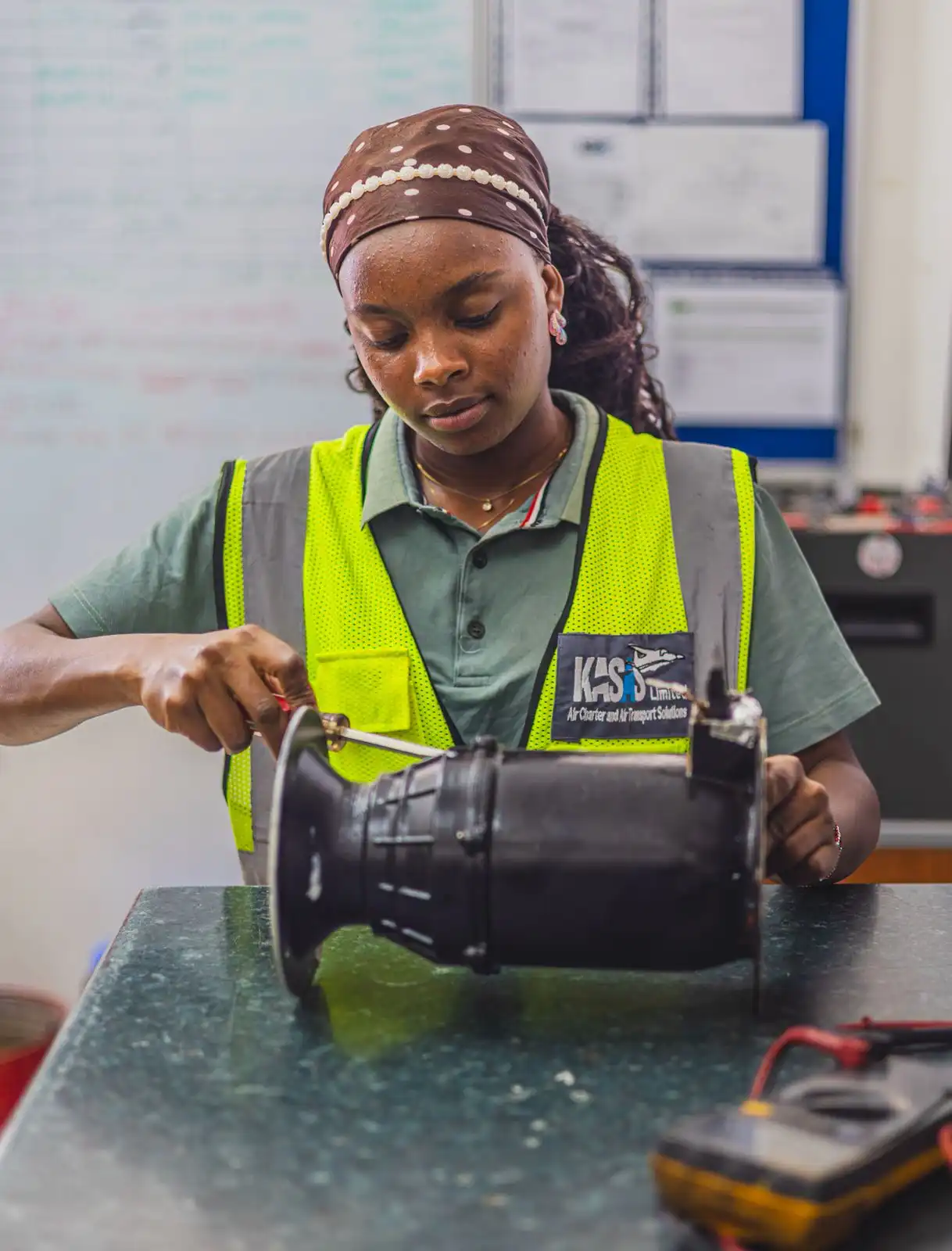 Aircraft technician working on avionics systems
