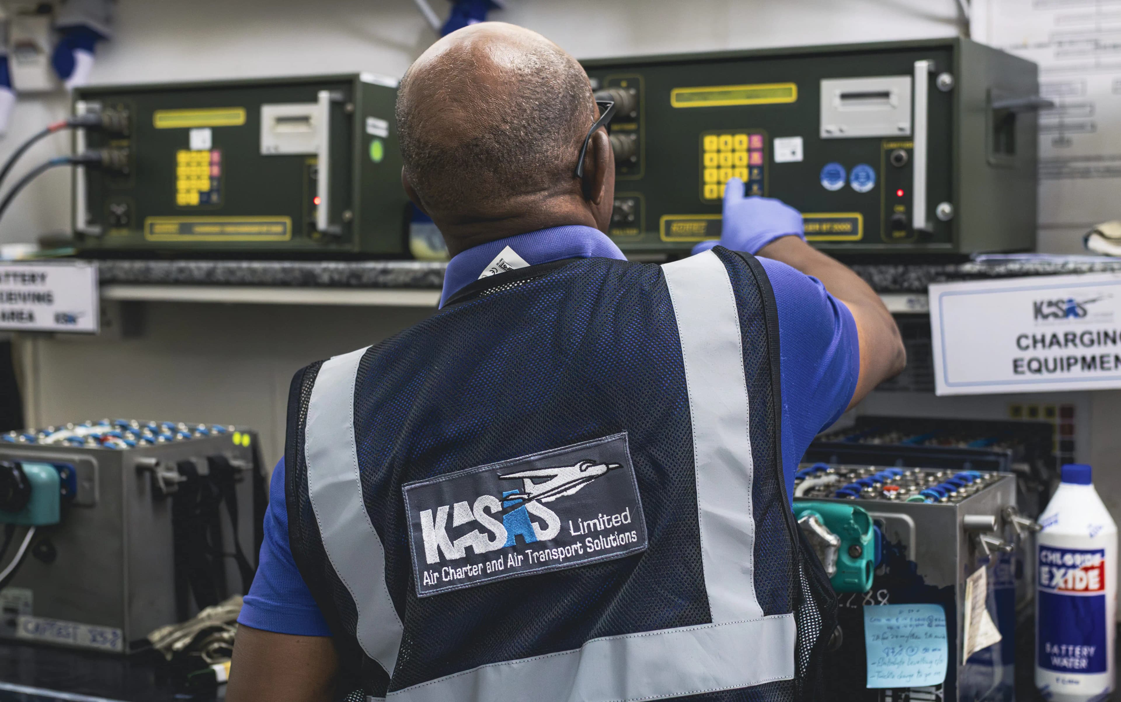 Kasas maintenance engineers working on Dornier 228 in hangar